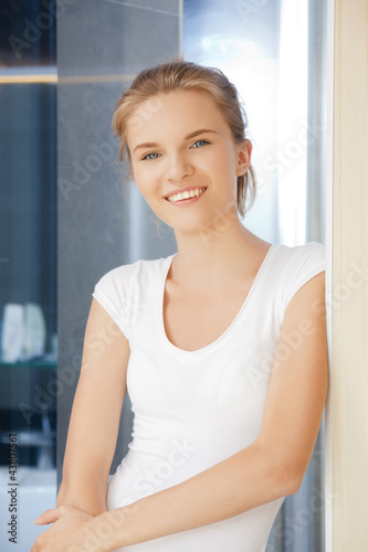 happy and smiling teenage girl in a bathroom Free Download happy and smiling teenage girl in a bathroom - GFXLoad