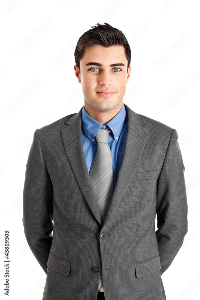 Handsome young businessman portrait isolated on white Handsome young businessman portrait isolated on white