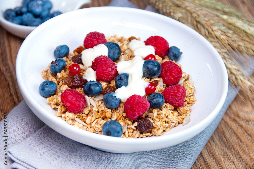 Muesli with raspberries, blueberries, beans and raisins Muesli with raspberries, blueberries, beans and raisins