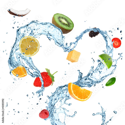 Fruit with water splash heart over white