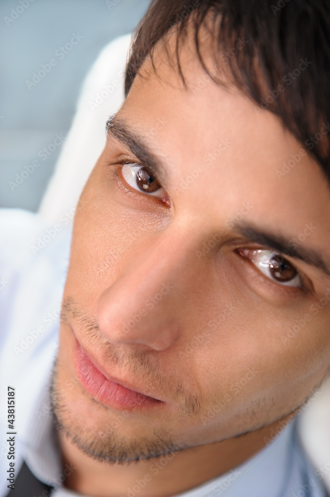 Fototapeta premium Closeup portrait of confident young businessman