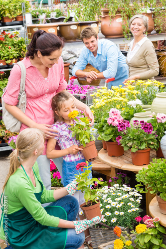 Family garden center shopping for flowers