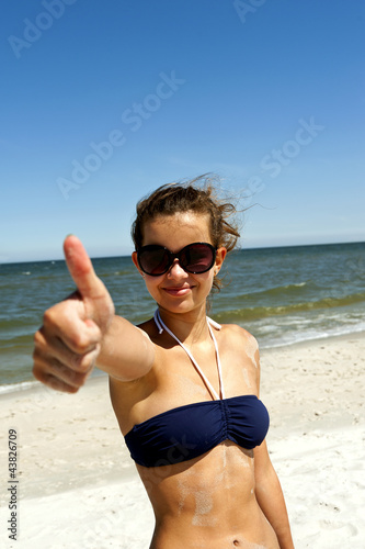 Woman On Sand With Ok Thumb
