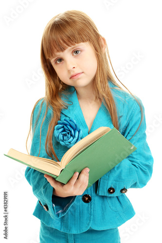 cute little girl reading a ...
