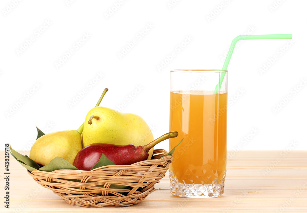 Pear juice with pears on wooden table on white background Pear juice with pears on wooden table on white background