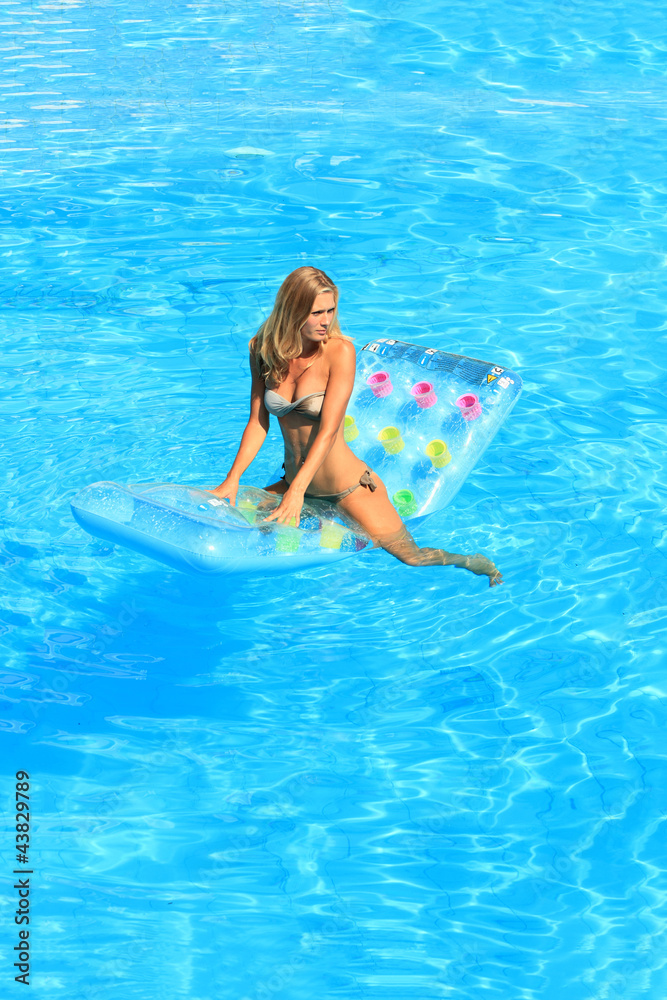 Woman Relaxing in a pool