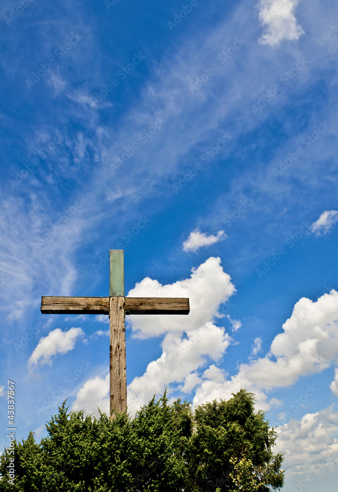Crucifix against blue sky