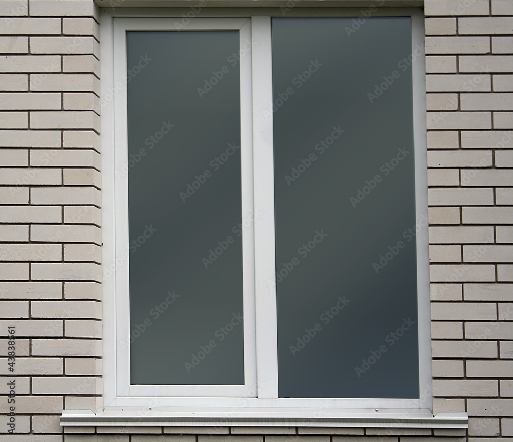 Fototapeta premium White brick wall and window