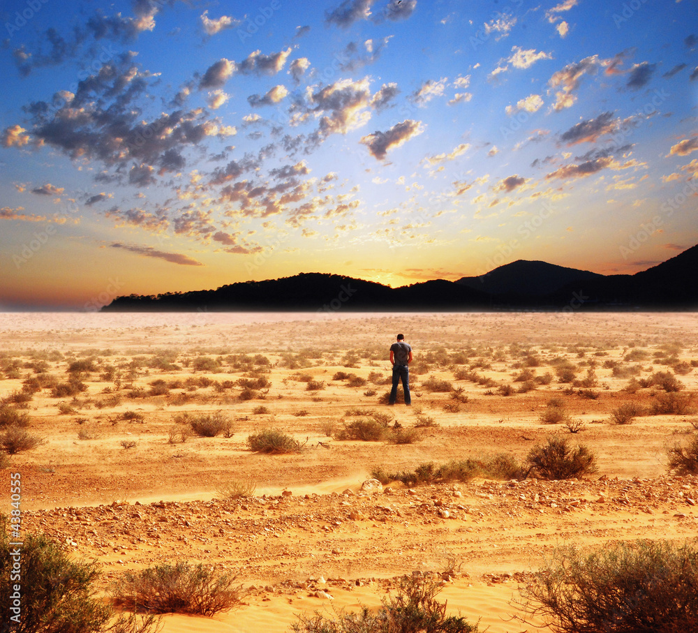 Lonely man in a desert
