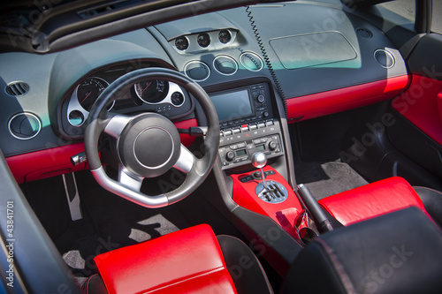 Sports car interior in red leather © Christian Delbert