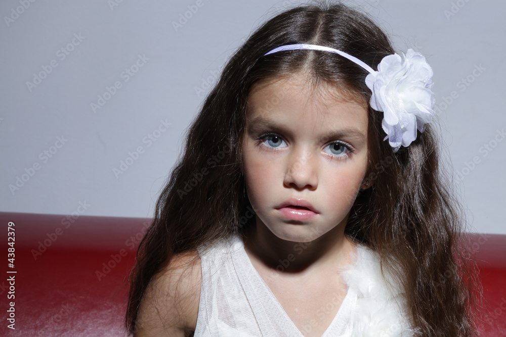 close up portrait of young beautiful little girl with dark hair close up portrait of young beautiful little girl with dark hair
