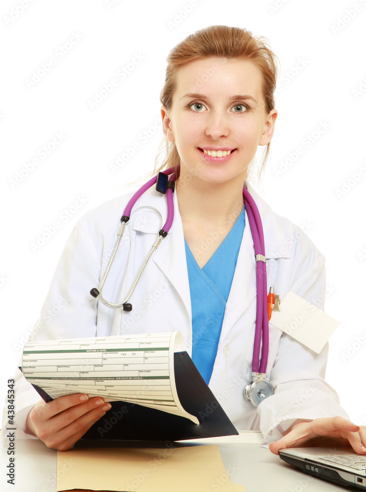 Doctor with stethoscope at her working place Doctor with stethoscope at her working place