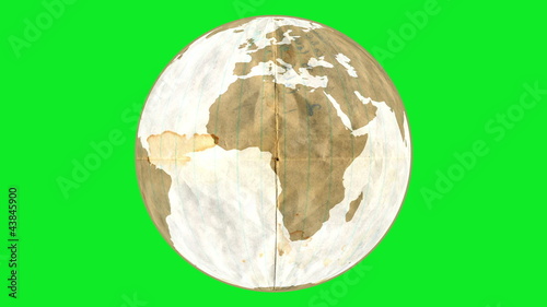 Animation of paper Earth, rotating on green screen.