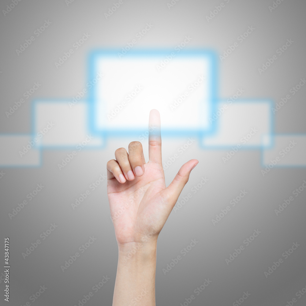 Hand pressing virtual button on futuristic holographic screen.