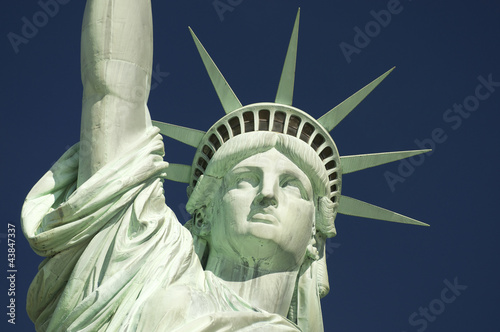 Statue of Liberty Close-Up Blue Sky Horizontal © lazyllama