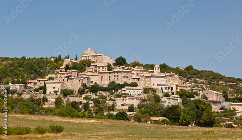 The hill top village of Simiane La Rotonde photo