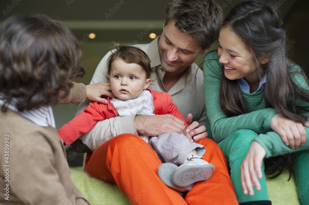 Happy man with their children at home Happy man with their children at home