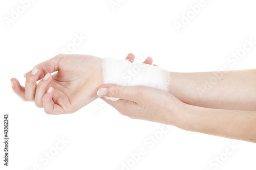 white medicine bandage on injury hand, isolated