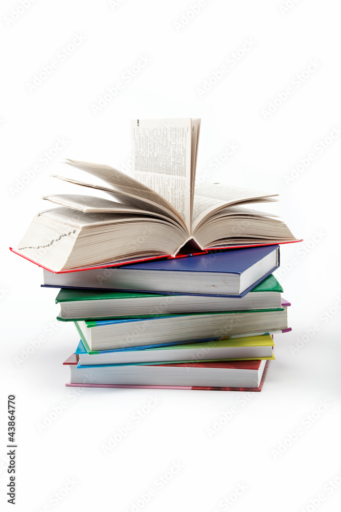 A stack of books on a white background. A stack of books on a white background.