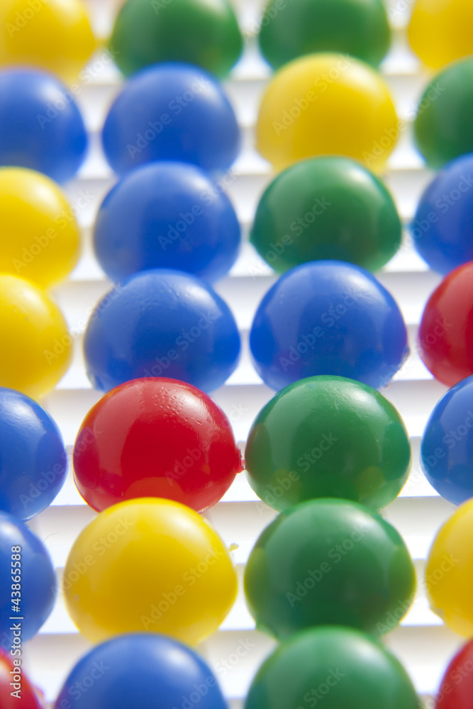 Colorful spheres toys abstract background macro
