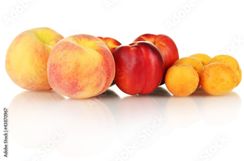 Ripe nectarines, apricots and peaches isolated on white