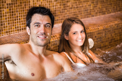Young couple relaxing in a spa