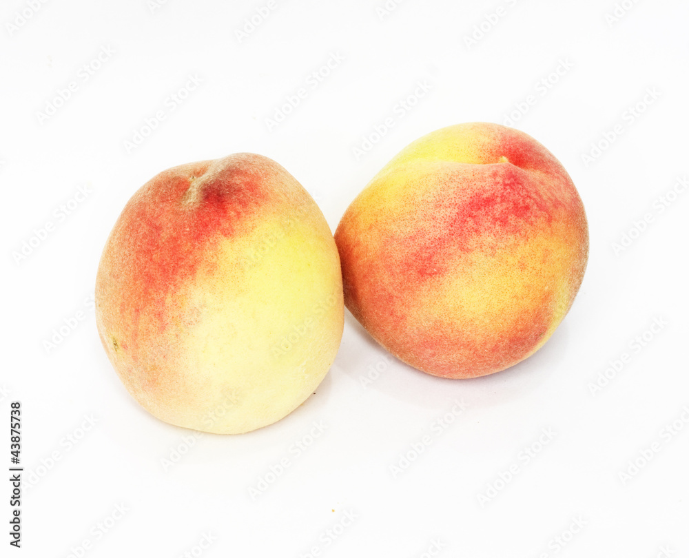 two peaches on white background two peaches on white background