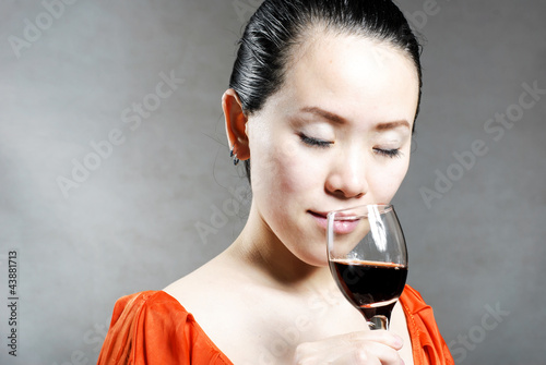 The girl in the open red wine