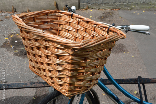 Bicycle with epty wicker panier photo