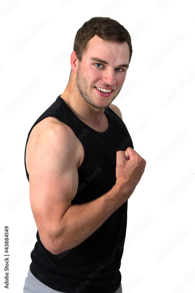 Young attractive man flexing his biceps Young attractive man flexing his biceps