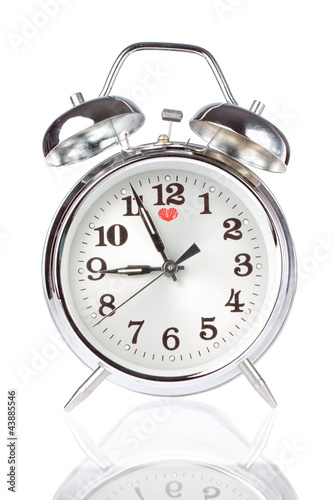 Silver Alarm Clock on a white background.