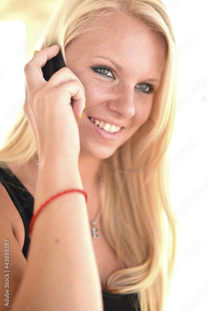 picture of happy teenage girl with cell phone picture of happy teenage girl with cell phone