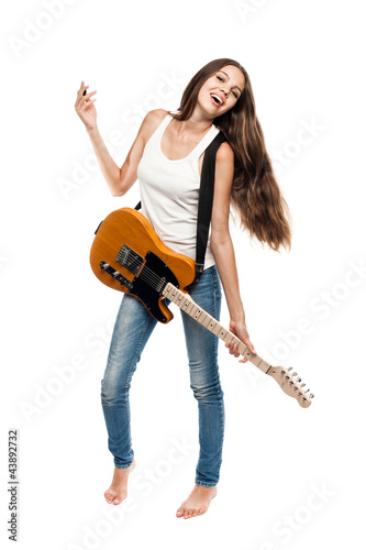 Beautiful young woman with electric guitar