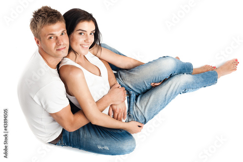 Happy young couple in casual clothing.