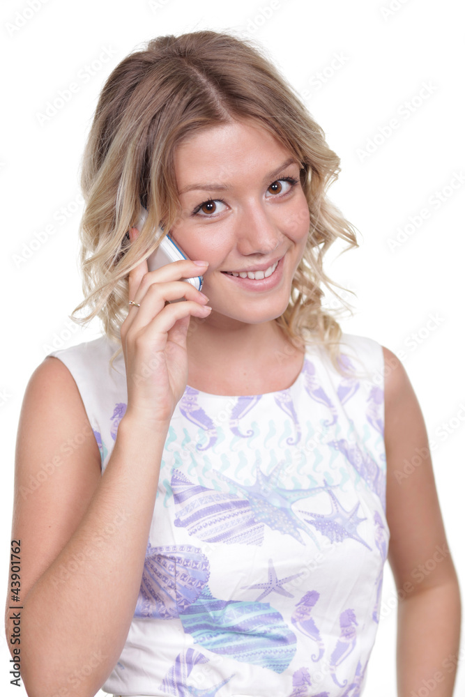 Young beautiful woman talking on cell phone Young beautiful woman talking on cell phone