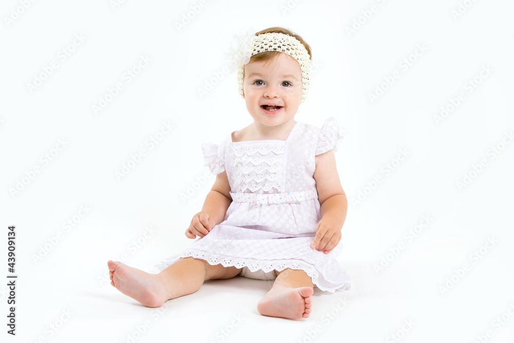 Adorable little baby girl laughing, creeping & playing in the st Adorable little baby girl laughing, creeping & playing in the st