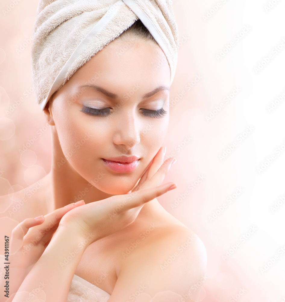 Spa Girl. Beautiful Young Woman After Bath Touching Her Face Spa Girl. Beautiful Young Woman After Bath Touching Her Face