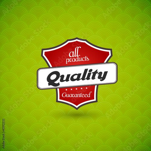 Green board with  product quality sign.