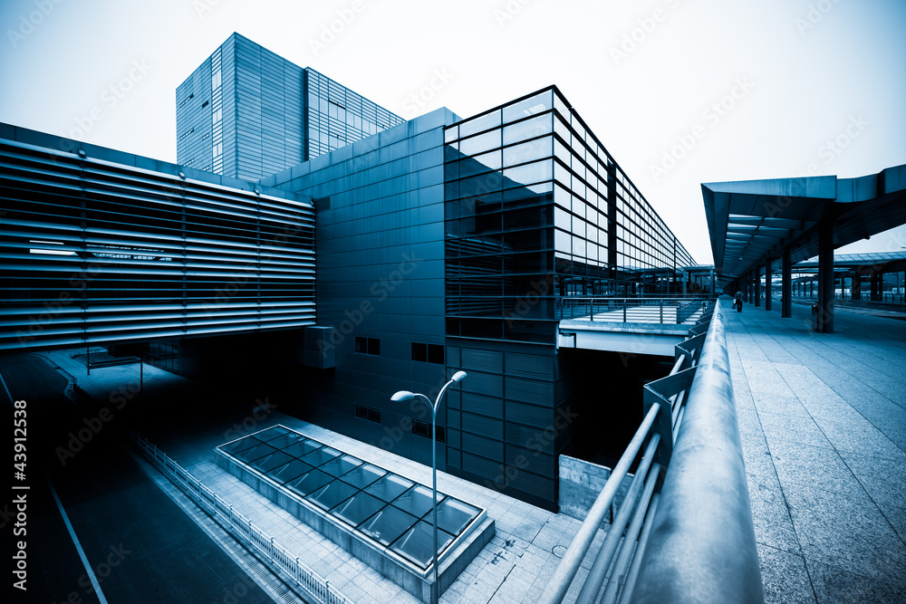 Fototapeta premium road go through the modern office building