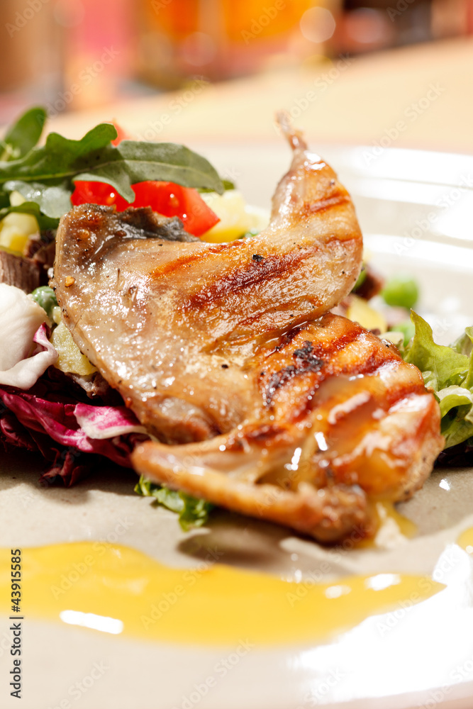 quail on the meat salad