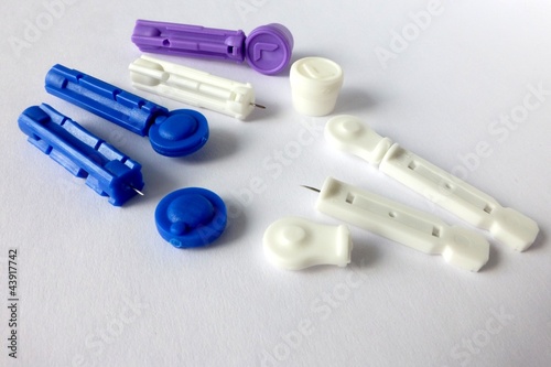 Various lancets for glucose meter lancing devices