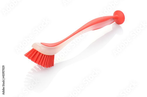 red crockery brush isolated on white