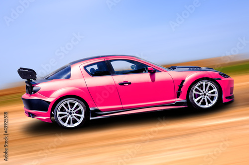 Pink sports car © katalinks