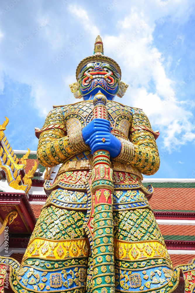 Giant statue at the gate in Wat Phra Kaew