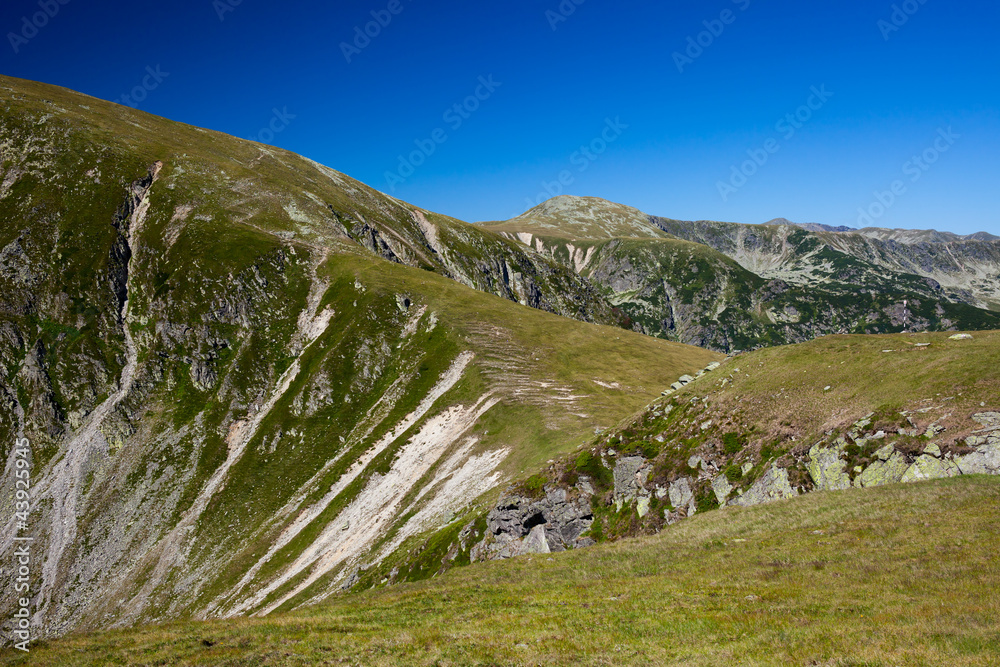 Fototapeta premium Mountains and blue sky