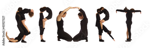 Black dressed people forming SPORT word over white