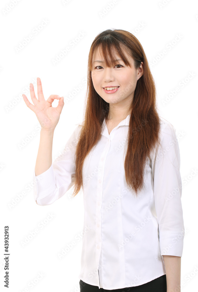 Young asian businesswoman with okay gesture Young asian businesswoman with okay gesture