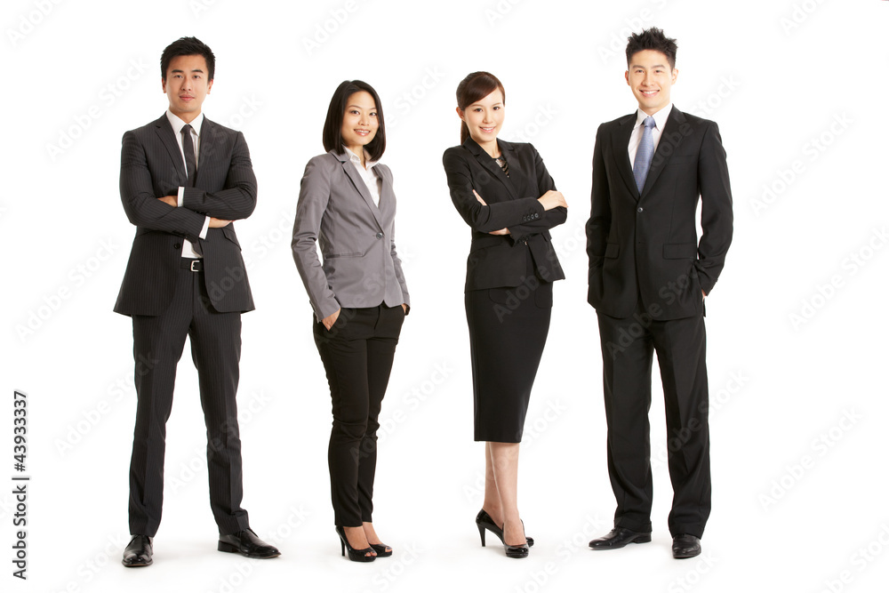 Full Length Studio Portrait Of Chinese Business Team Full Length Studio Portrait Of Chinese Business Team