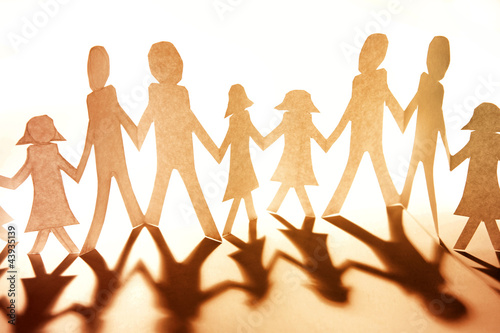 Принти на полотні Family paper chain holding hands united together