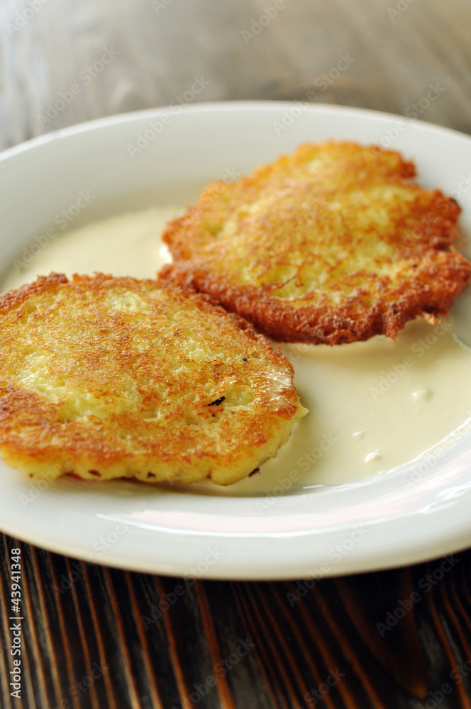 Fried potato pancakes with sour cream Fried potato pancakes with sour cream